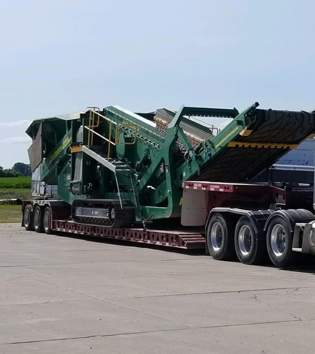 Our Crusher loaded up on low boy